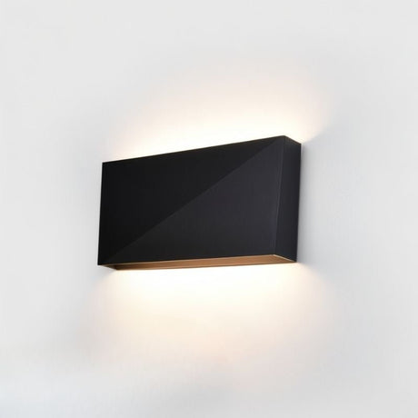 "sleek matte black wall lamp, aluminum material, geometric angular design, soft ambient light for modern interiors"