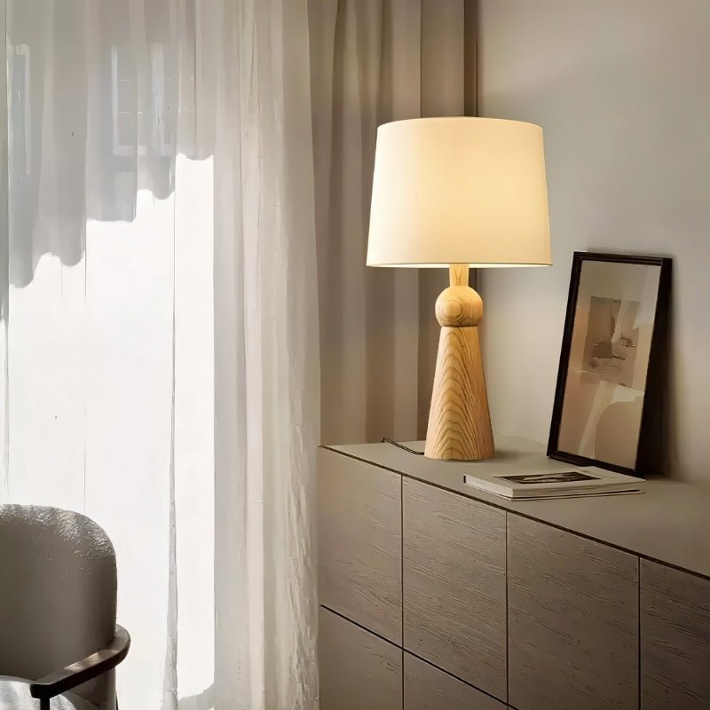 "Wooden base and fabric shade, modern lamp for the living room, offering warm, soft lighting, crafted from durable wood and fabric."