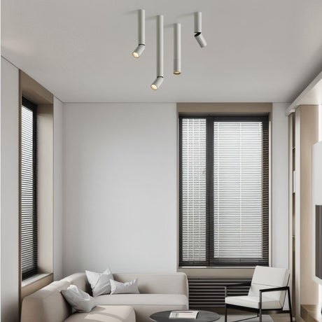 "Modern ceiling light fixture with adjustable heads, aluminum material, clean lines in a cozy lounge area"