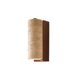 "Front view of a wall lamp featuring a cylindrical travertine shade and a rectangular wooden backplate."