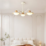 "Chandelier lighting a cozy bedroom, curved arms, natural materials, diffused glow"