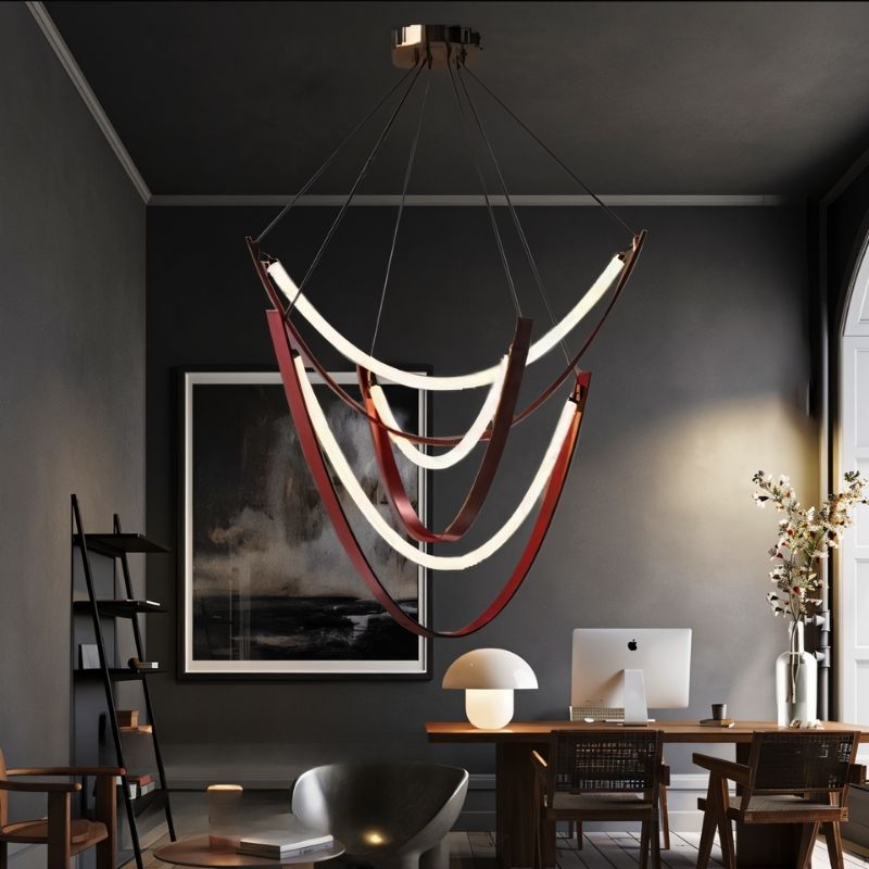 "Modern chandelier with cascading leather straps and glowing glass arcs in a contemporary office setting, enhancing ambiance."