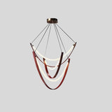 "Suspended chandelier featuring curved leather straps and glowing glass arcs, perfect for luxury interiors."