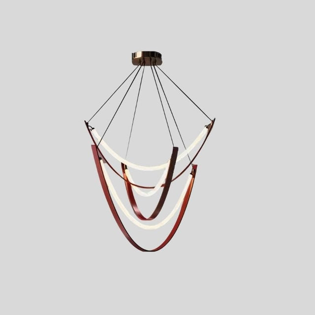 "Suspended chandelier featuring curved leather straps and glowing glass arcs, perfect for luxury interiors."