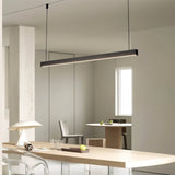 "Linear pendant light above modern dining table, aluminum track, minimalist ceiling fixture, soft illumination"