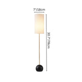 "Floor lamp with a cylindrical fabric shade, wooden pole, spherical base, and height dimensions of 30.7 inches"