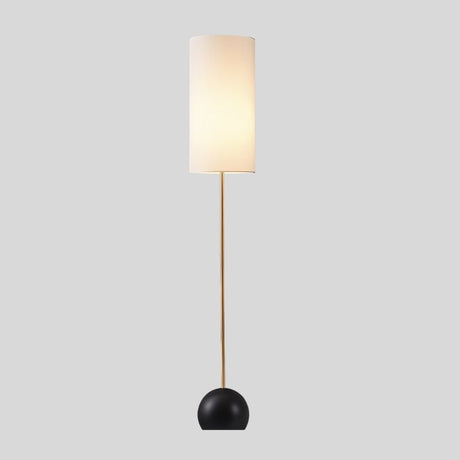 "Isolated view of floor lamp, cylindrical fabric shade, slim wooden pole."