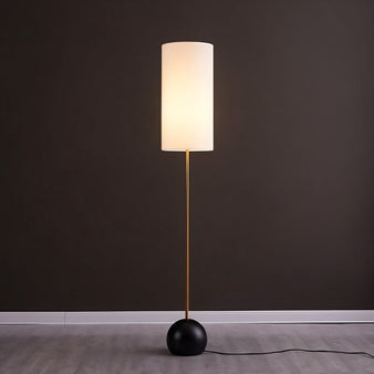 "Minimalist floor lamp, ambient lighting, slim design with spherical base."