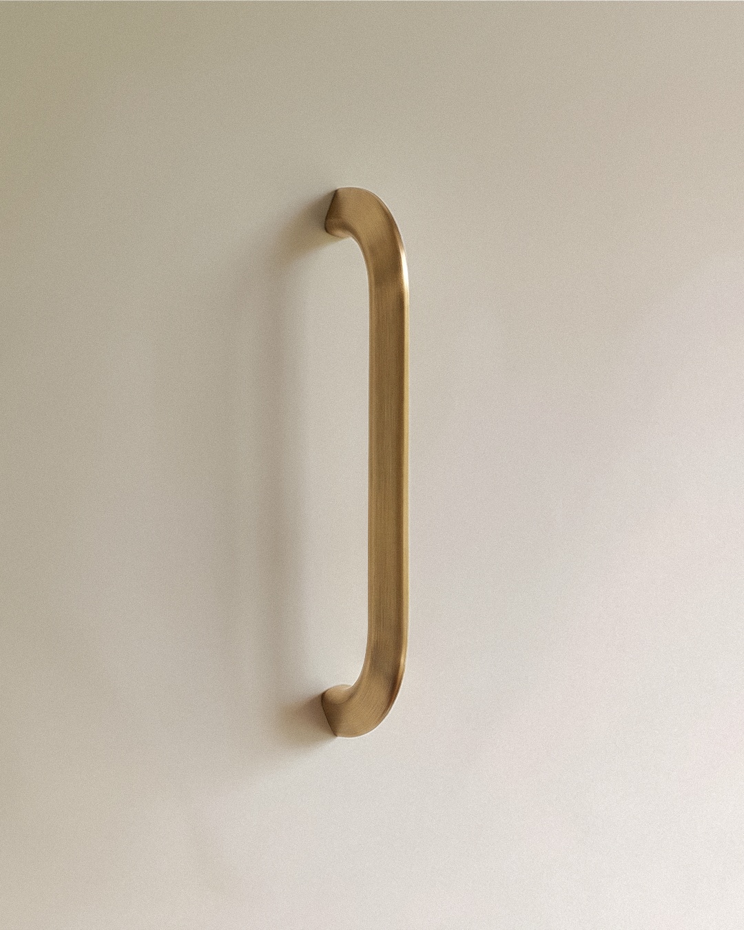 Enzo Cabinet Pull 6" in Satin Brass, on a plain background