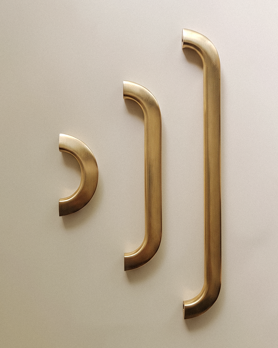 Enzo Cabinet Pull shown in all available sizes, in Satin Brass