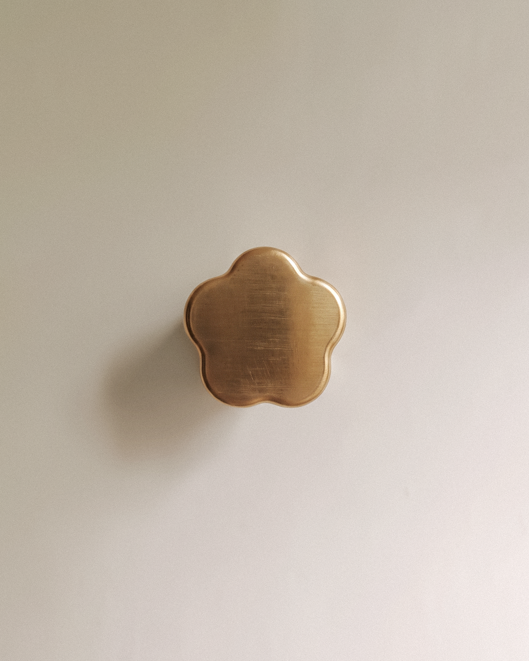 Gatsby Cabinet Knob in Satin Brass front view, on a plain background