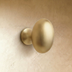 Two ceramic drawer knobs shown side-by-side against white background. Top knob features oval shape, 1.3 inches wide and 0.8 i