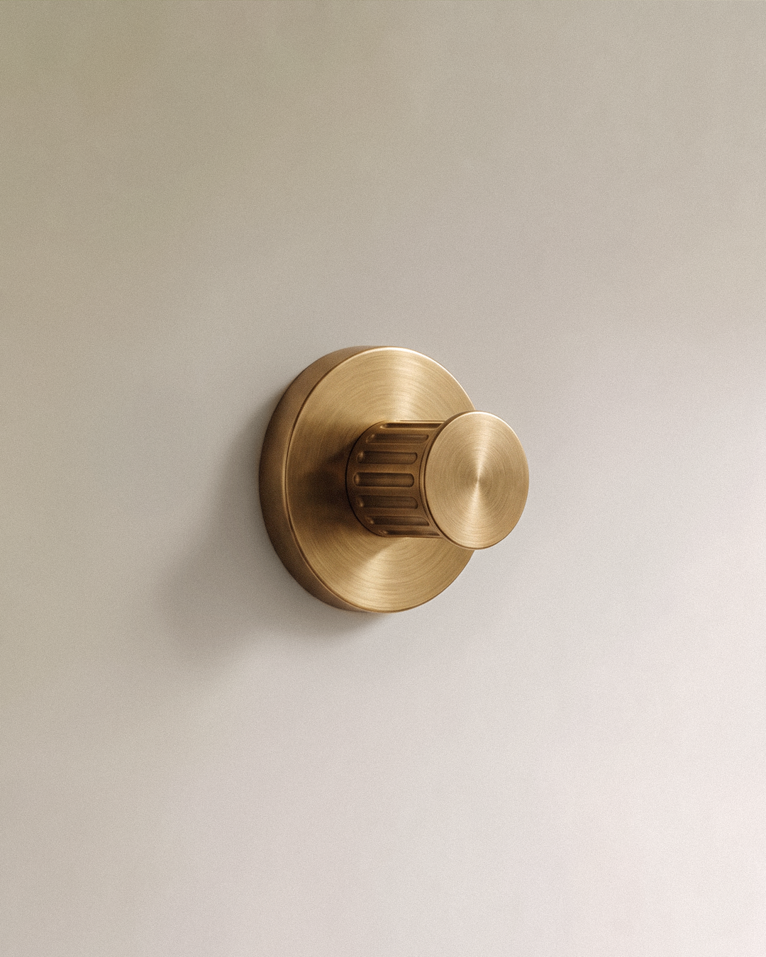 Vestige Door Lock in Satin Brass, on a plain background