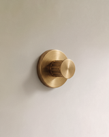 Vestige Door Lock in Satin Brass, on a plain background