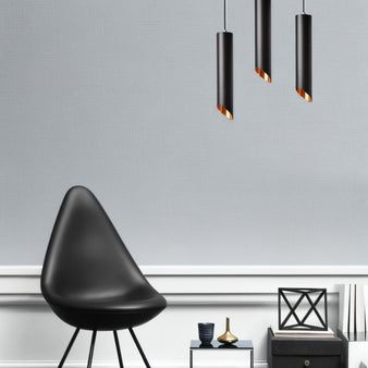 "Matte black cylindrical pendant lights, minimalist lighting, aluminum finish, enhancing modern interiors"