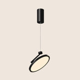 "Modern black pendant light with circular LED panel, minimalist adjustable design, durable metal and plastic materials"