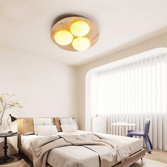 "Ceiling lamp in bedroom setting, circular travertine base, opal glass globes, soft ambient lighting, warm cozy glow"