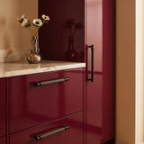 Vestige Cabinet Pull in Satin Brass, styled interior
