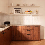 Vestige Cabinet Pull in Satin Brass, styled interior