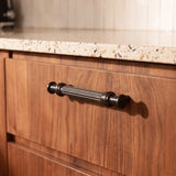 Vestige Cabinet Pull in Satin Brass, styled interior