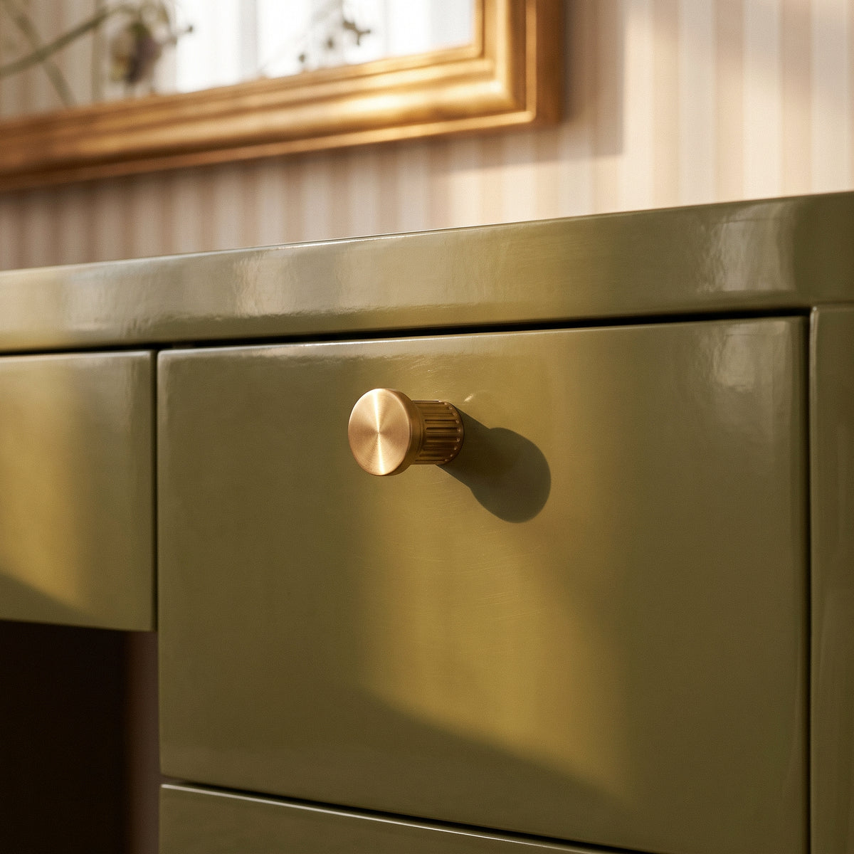 Vestige Cabinet Knob in Satin Brass, styled interior
