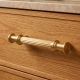 Vestige Cabinet Pull in Satin Brass, styled interior