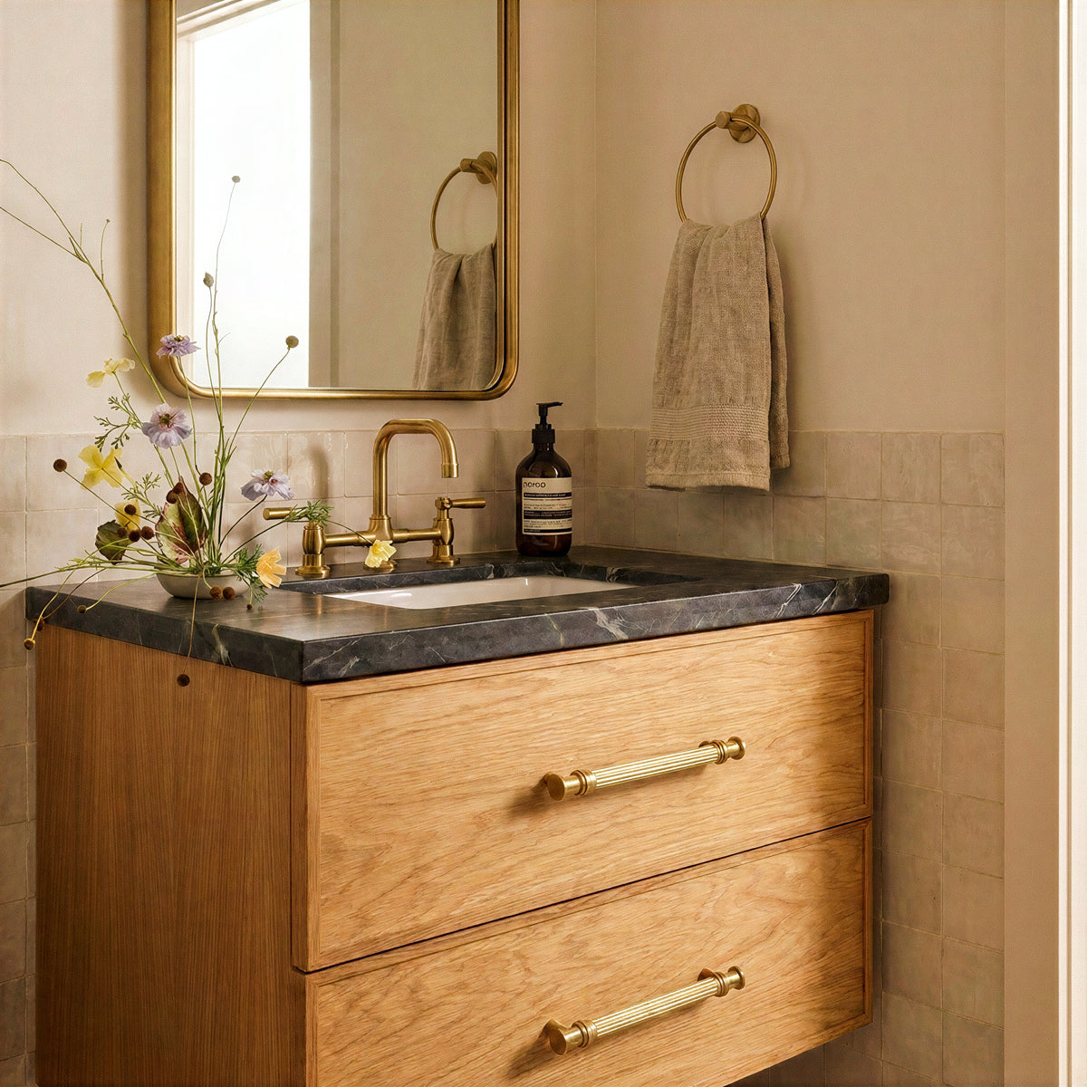 Vestige Cabinet Pull in Satin Brass, styled interior