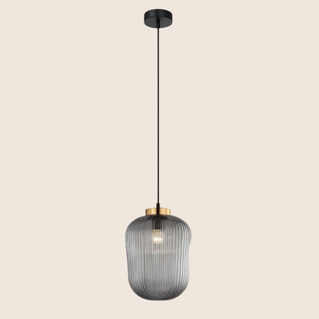 "Pendant light with striped glass shade and gold top, offering elegant illumination for modern interiors."