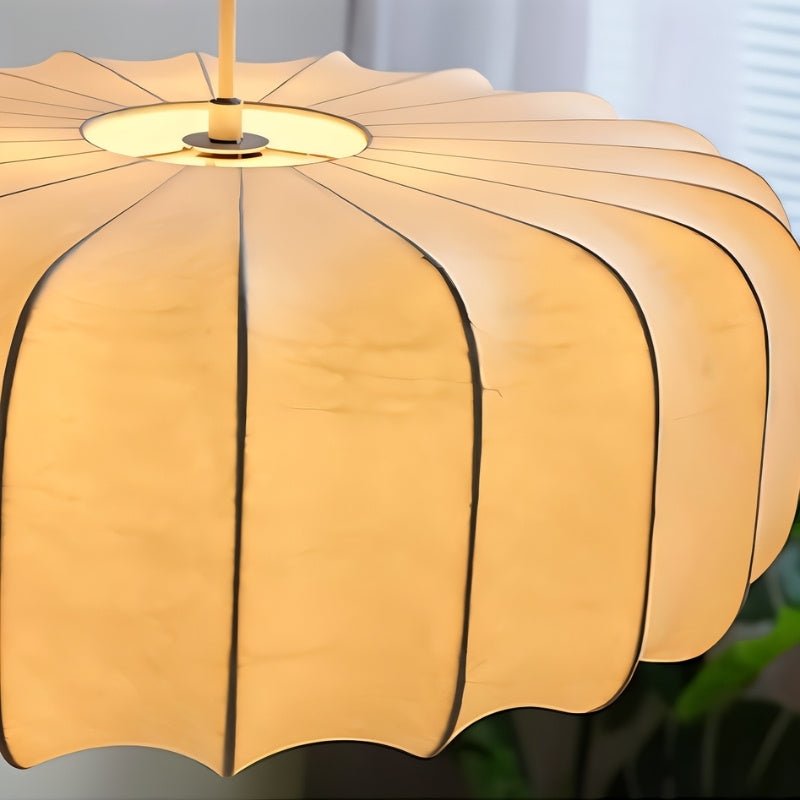 "Close-up of the pleated iron and silk pendant light, highlighting its intricate design and sophisticated craftsmanship."