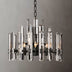 Prizma Round Chandelier with clear glass prisms and black metal frame, hanging against a plain background.