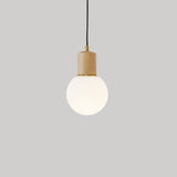"Wooden holder spherical pendant light providing even illumination, enhancing both functionality and aesthetics in any space."