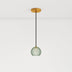 A green glass pendant light with a round shape, approximately 12 inches in height, hanging from a black cord and gold ceiling