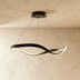 Multi-colored glass sphere pendant lights in pink, blue, and