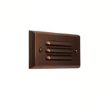 "Close-up view of a sleek, horizontal grille brass step light fixture, made from durable, weather-resistant brass, designed for outdoor lighting applications"