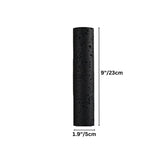 "Black travertine cylindrical wall lamp showing dimensions of 9 inches/23 cm height and 1.9 inches/5 cm width."