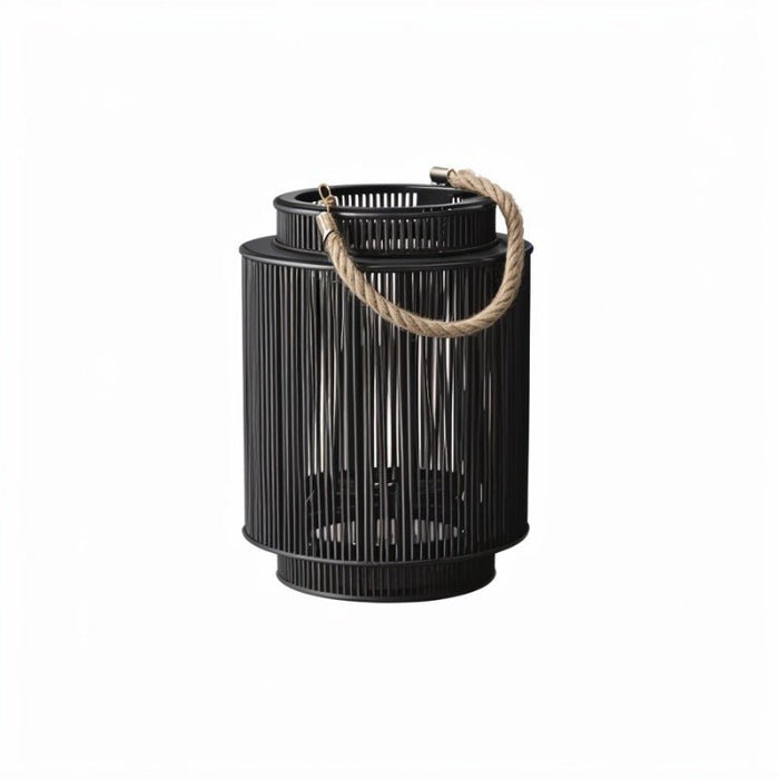 Adara Rustic Woven Rattan Floor Lantern: Crafted from woven rattan and natural fibers, this floor lantern adds warmth and texture to farmhouse-inspired interiors, perfect for creating a cozy and inviting atmosphere.