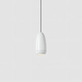 Ailis Pendant Light in white with a minimalist capsule shape, ideal for contemporary indoor spaces with integrated LED lighting.