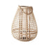 A natural-colored woven floor lantern in an elongated teardrop shape, with a sturdy handle for easy portability.