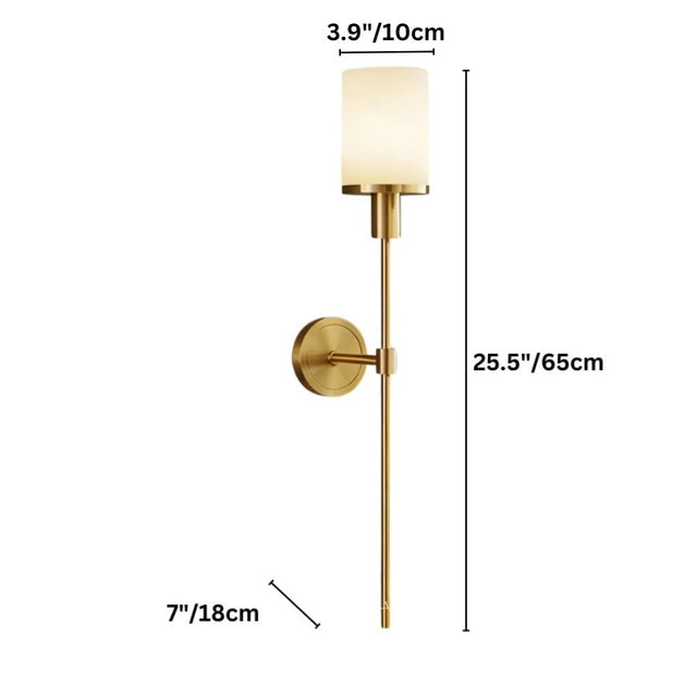"Diagram showing the dimensions (25.5"/65cm height, 7"/18cm extension, 3.9"/10cm width) of a modern brass wall lamp with a cylindrical alabaster shade."