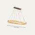 Modern oval chandelier in gold finish, measuring 27.6" (70cm) wide, suspended with adjustable cables on a white background.