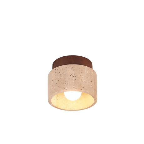 "Illuminated cylindrical yellow travertine ceiling light with dark wood top, modern design."