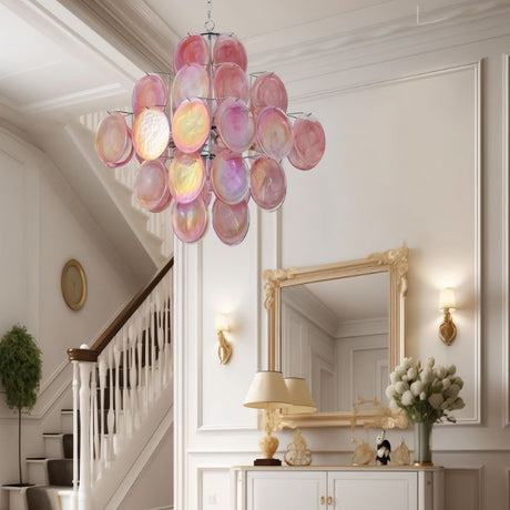 "A Murano glass disc chandelier in a grand entryway."