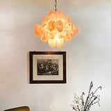 "A Murano glass disc chandelier in an interior setting."