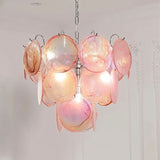 "A close-up of a pink Murano glass disc chandelier."