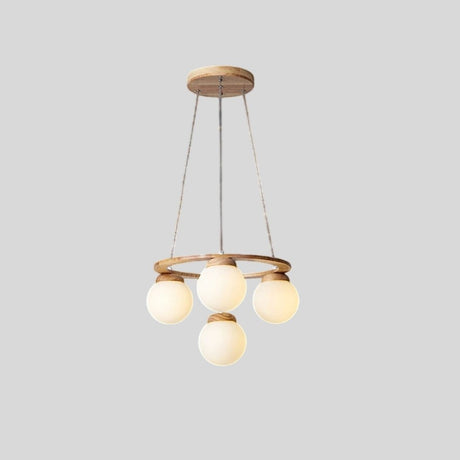 "Circular wood frame chandelier with four frosted glass globes, suspended by cables, isolated on a light gray background."
