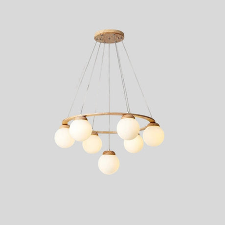 "Circular wood frame chandelier with seven frosted glass globes, suspended by cables, isolated on a light gray background."