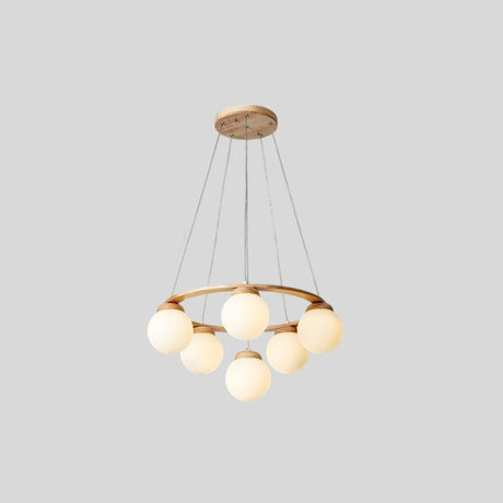 "Circular wood frame chandelier with six frosted glass globes, suspended by cables, isolated on a light gray background."