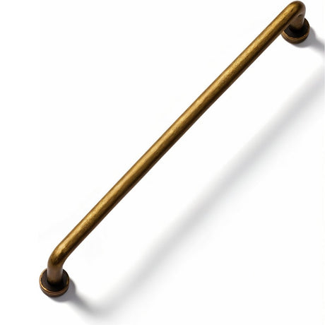 "A minimalist antique brass pull bar handle made of durable zinc with a slim, cylindrical design and rounded ends, suitable for cupboards, cabinets, drawers, and wardrobes."