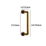 "Dimensions of a minimalist antique brass pull bar handle made of durable zinc with a slim, cylindrical design and rounded ends: 3 inches center-to-center, 3.6 inches overall length, and 1.3 inches in depth."