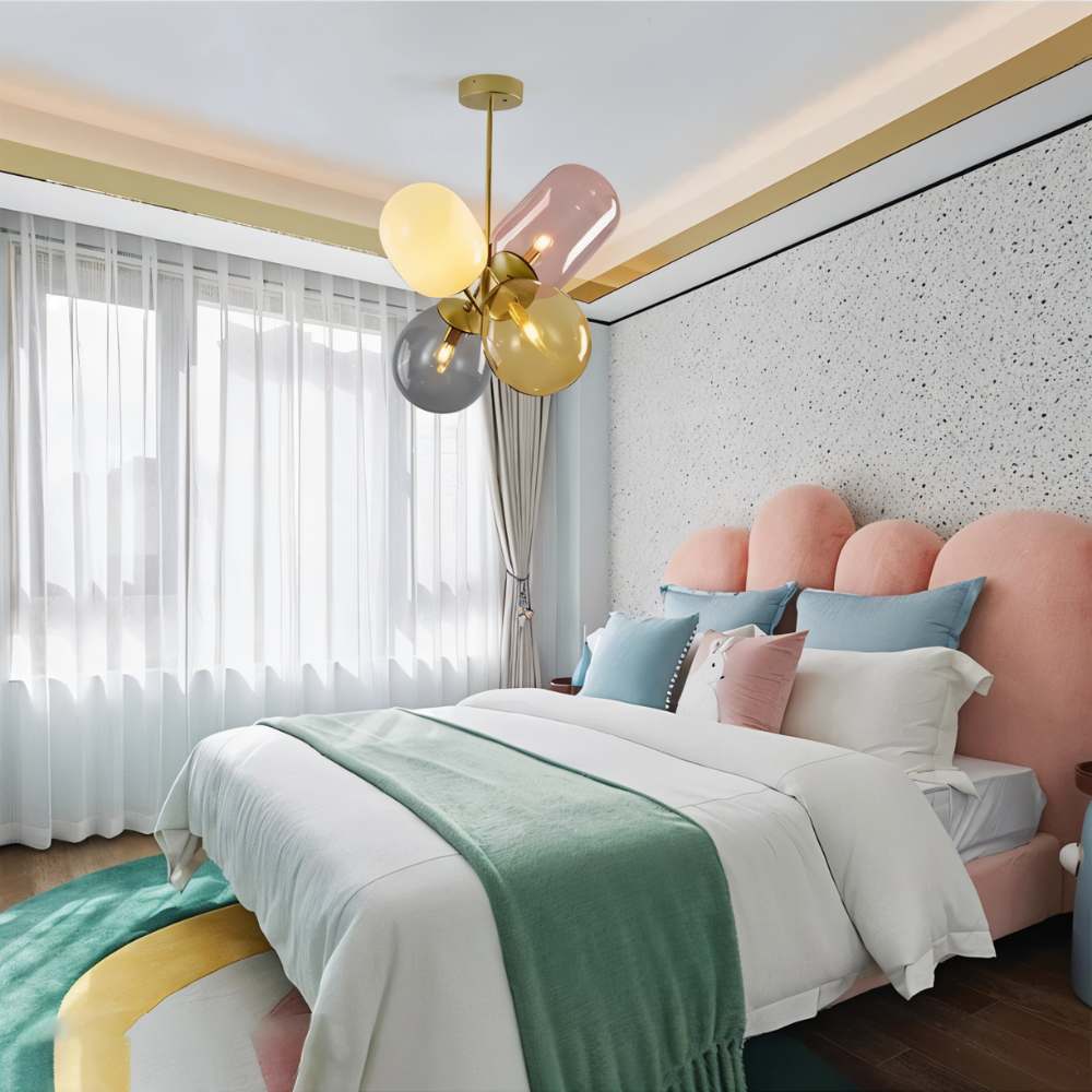 "Modern pendant light with clustered asymmetrical glass shades in a contemporary bedroom."
